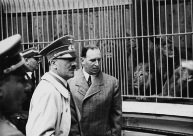 Adolf Hitler vitising the lion house at the newly built zoo in Nuremberg with Willy Liebel, mayor of Nuremberg